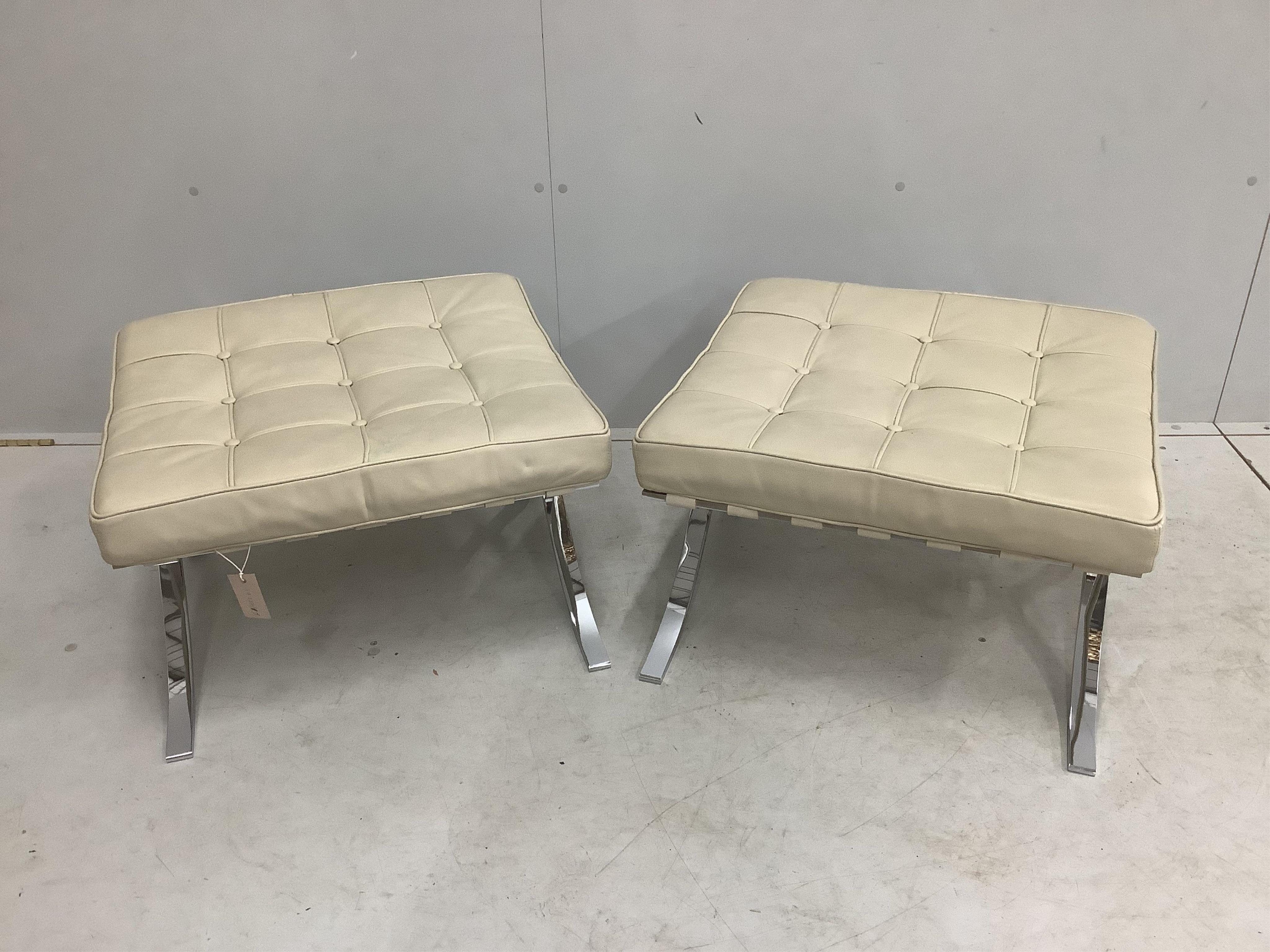 A pair of Barcelona style ivory leather and chrome ottoman stools, width 61cm, depth 58cm, height 36cm. Condition - good